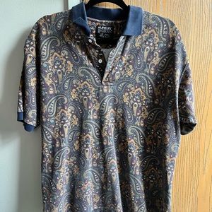 Vintage short sleeve men’s collared shirt. Gently worn.